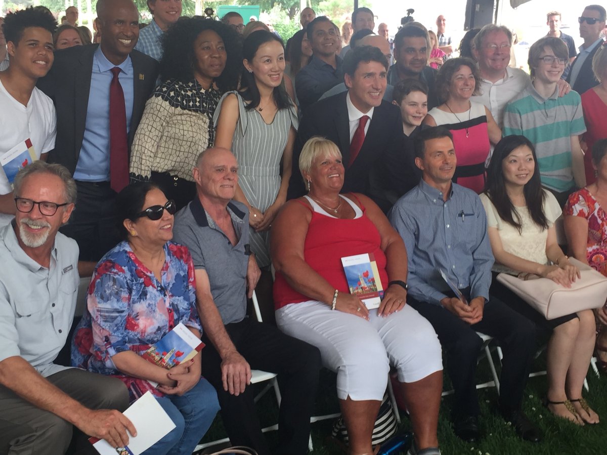 The Prime Minister was a surprise guest at a citizenship ceremony in Kelowna on Wednesday. He posed for pictures with some of the new Canadians being sworn in. 