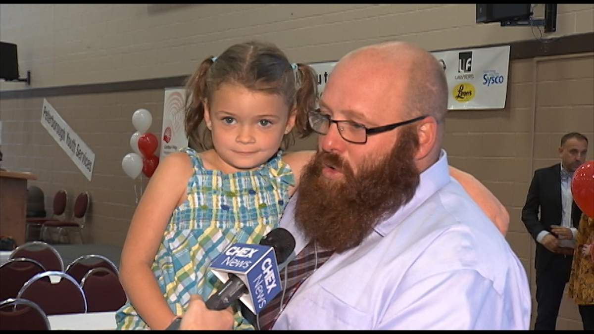 Robert Hamm with his daughter Reah-Jo. He says agencies funded by the United Way helped get his life back on track.