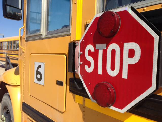 A school bus and a car collided in an intersection in Grande Prairie, Monday, Nov. 20, 2017.