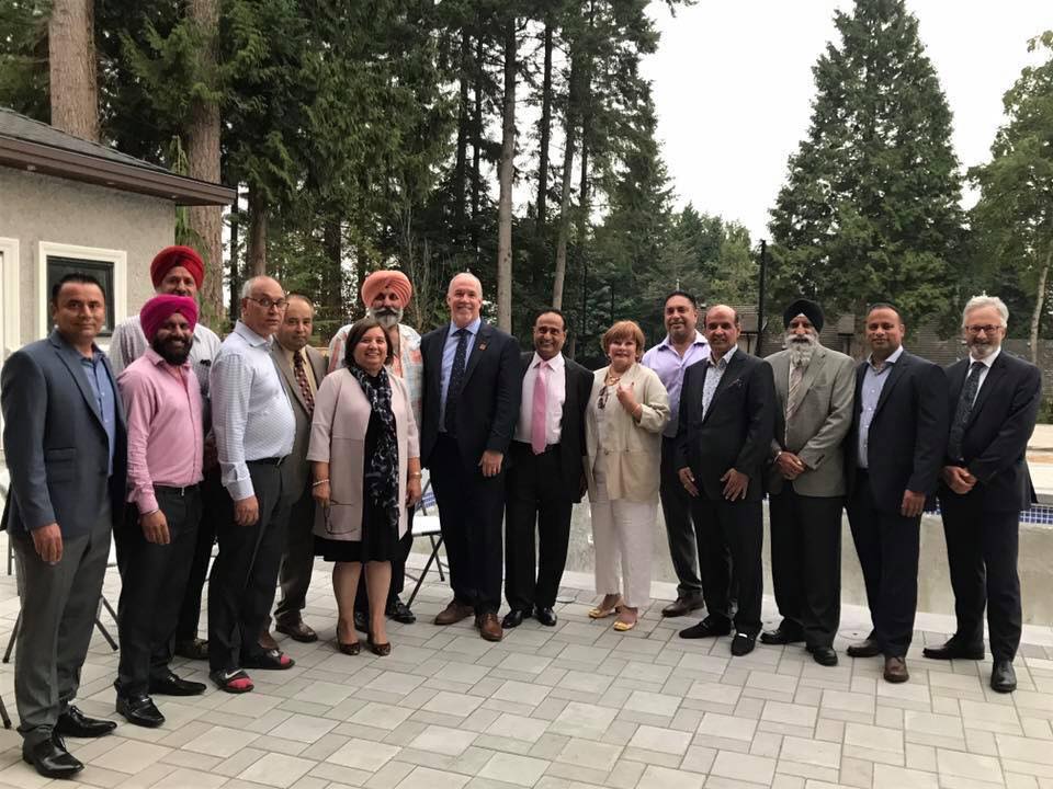 In this photo B.C. Premier John Horgan is photographed with CEO of Dhesi Enterprises Kulwant Dhesi, Surrey Mayor Linda Hepner, Horgan’s Chief of Staff Geoff Meggs and convicted shooter Maninder Gill. 