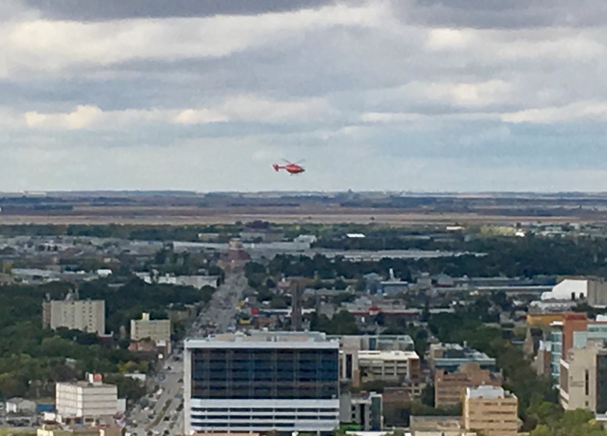 STARS Air Ambulance landing on top of Health Sciences Centre following rollover near Headingley.
