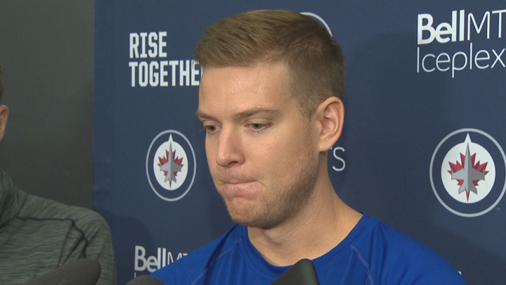 Winnipeg Jets goalie Steve Mason talks with the media on the first day of training camp.