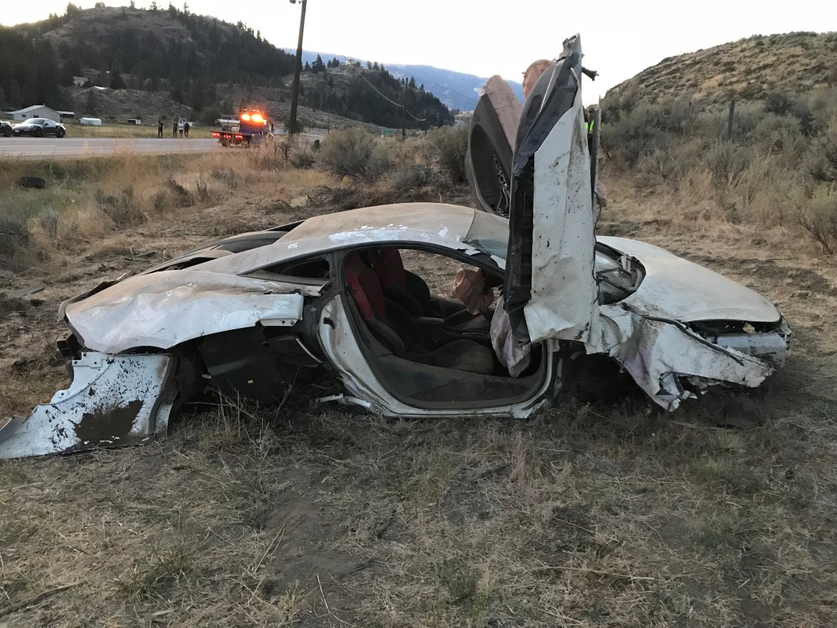 Two men were injured and this McLaren 570S was destroyed when the driver lost control and the vehicle went off Highway 3. 