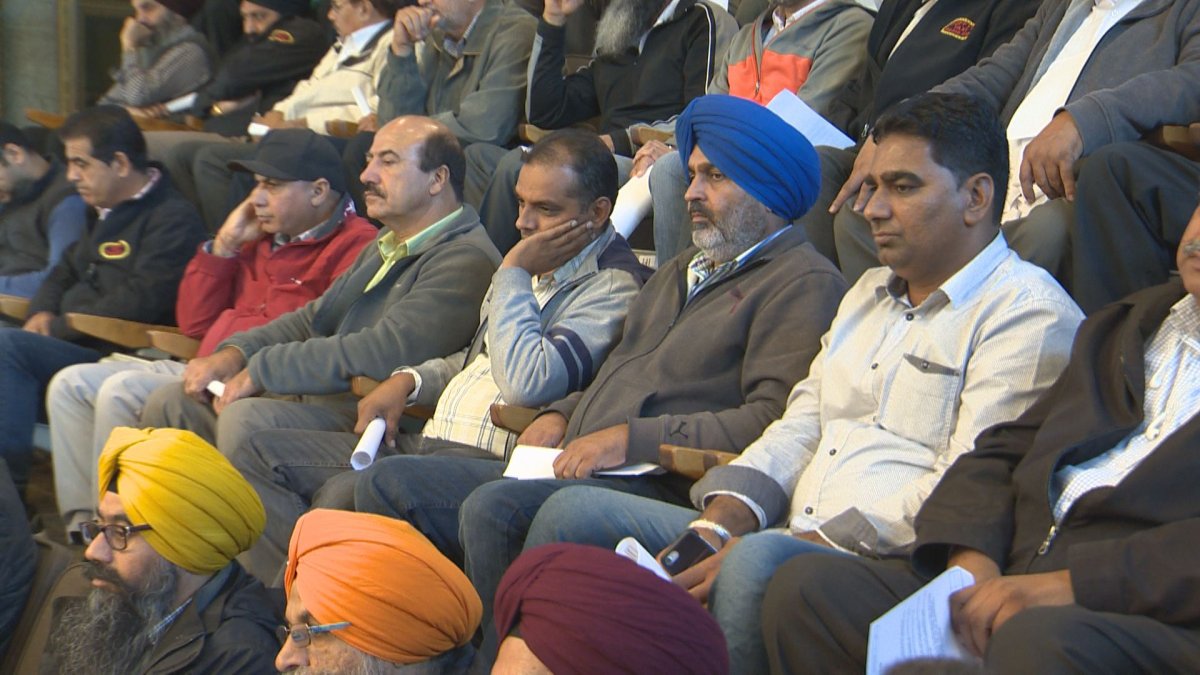 More than a dozen Winnipeg taxi drivers went to city hall Wednesday to try and get their voice heard .
