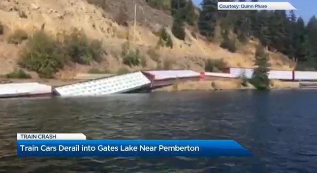 The train cars in Gates Lake on Monday.