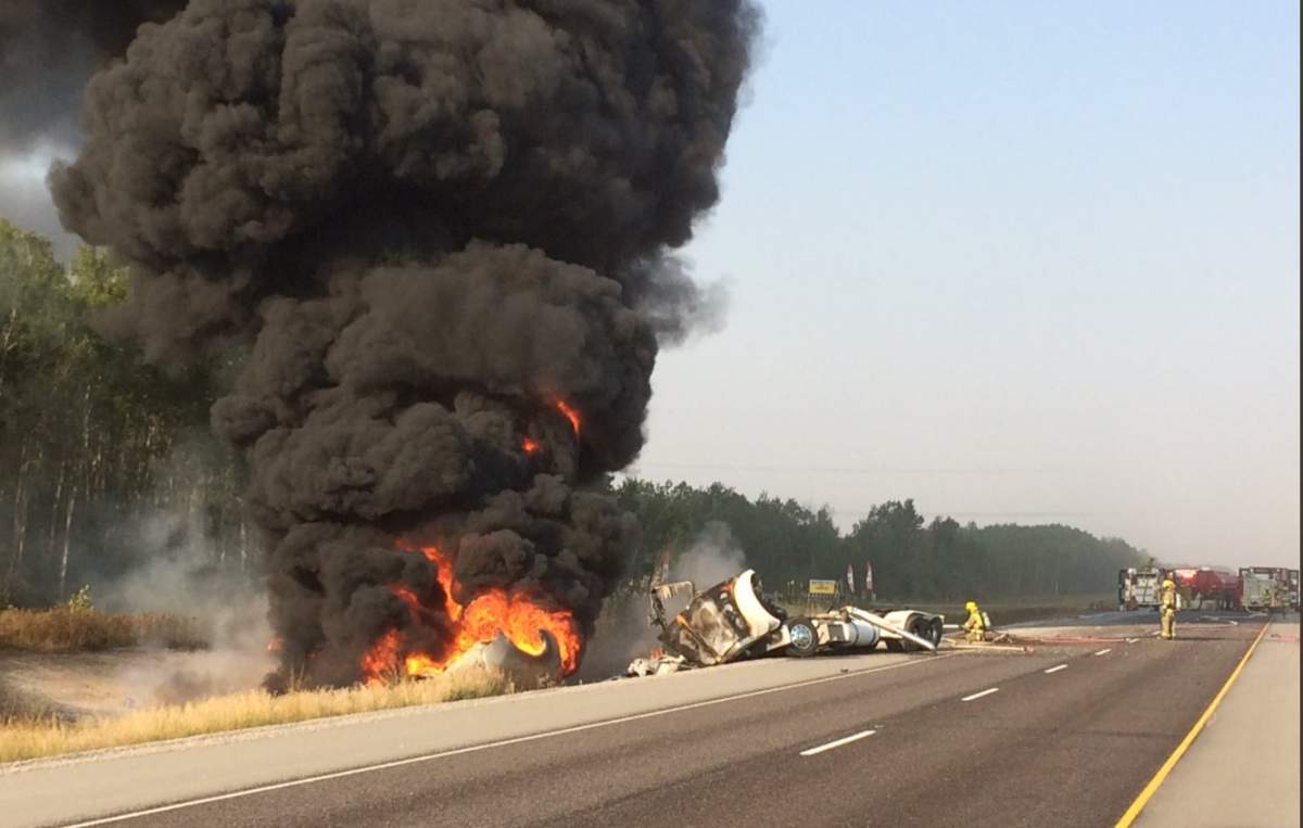 A giant plume of dark smoke and flames rose over the Trans-Canada east of Winnipeg Wednesday morning after a fuel truck fire.

