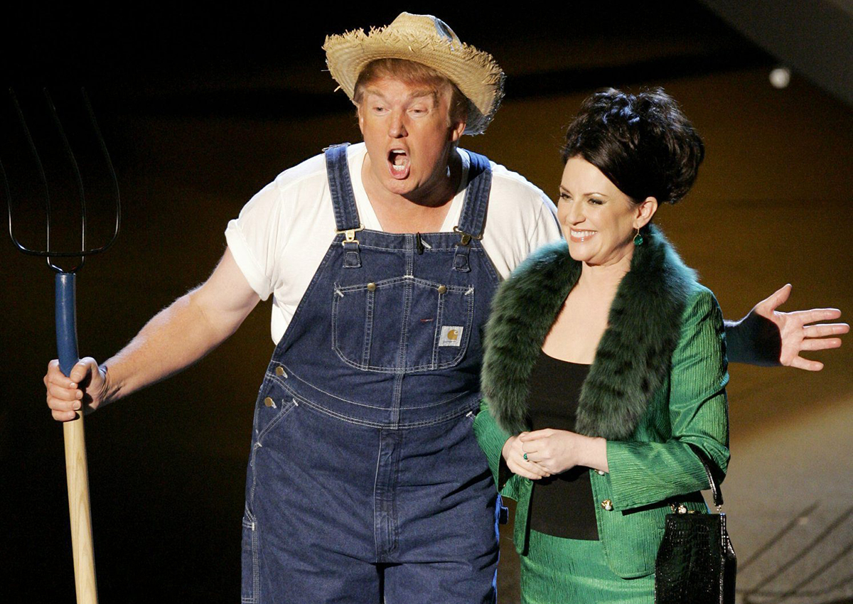 Donald Trump does a parody of famous television theme songs with Megan Mullally, of the comedy series "Will & Graces" during the 57th Annual Primetime Emmy Awards Sunday, Sept. 18, 2005, at the Shrine Auditorium in Los Angeles. 