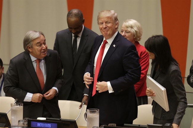 United States President Donald Trump, center, gets up to leave after making a quick statement at a meeting during the United Nations General Assembly at U.N. headquarters, Monday, Sept. 18, 2017.