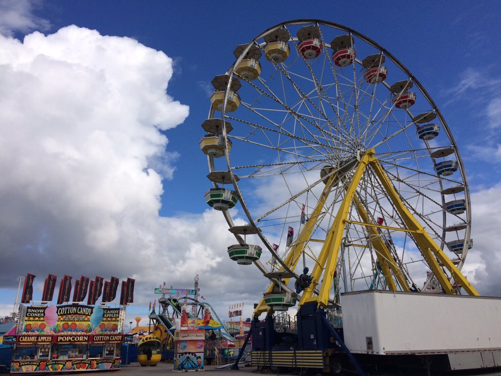 A 110-foot giant ferris wheel waits for patrons on the opening day of the Western Fair.