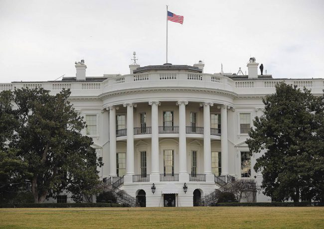A person carrying guns near the White House Sunday was arrested, according to the U.S. Secret Service.