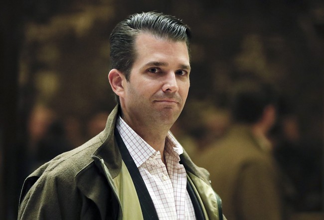 In this Nov. 16, 2016 photo, Donald Trump Jr., son of President-elect Donald Trump, walks from the elevator at Trump Tower in New York.