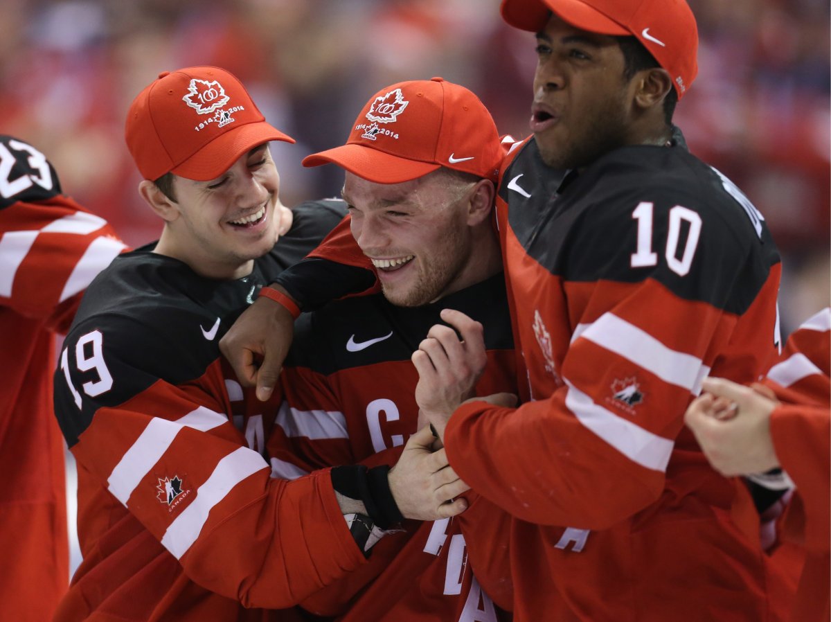 TORONTO, CANADA. JANUARY 5, 2015. Canada's Nic Petan, Max Domi, and Anthony Duclair (L-R) celebrate winning the 2015 IIHF World Junior Championship final ice hockey match against Russia at the Air Canada Centre. The Canadian team won the game 5:4. Yelena Rusko/TASS.
