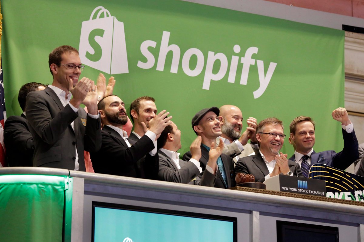 Shopify CEO Tobias Lutke is celebrated as he rings the New York Stock Exchange opening bell, marking the Canadian company's IPO, Thursday, May 21, 2015.
