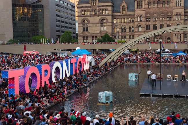 Crowds gather by the 3D Toronto sign in Nathan Phillips Square to mark
Canada Day and the 150th Anniversary, July 1, 2017.