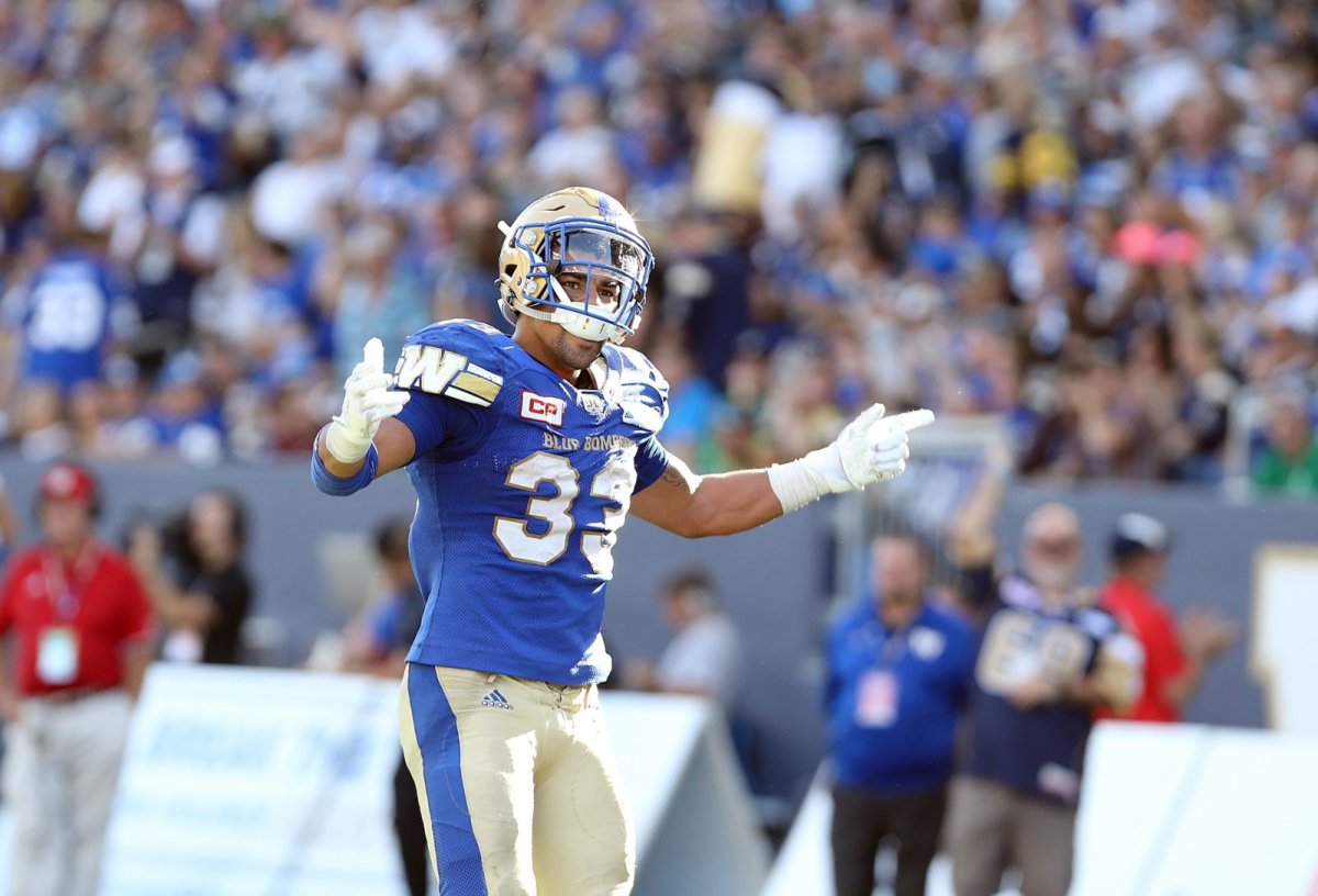 Winnipeg Blue Bombers RB Andrew Harris salutes the crowd during fourth quarter CFL action between the Bombers and the Saskatchewan Roughriders in Winnipeg on Saturday, Sept. 9, 2017. 