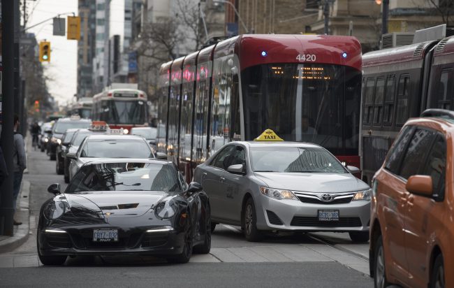 Eastbound traffic on Simcoe Street in Toronto, May 11, 2017.