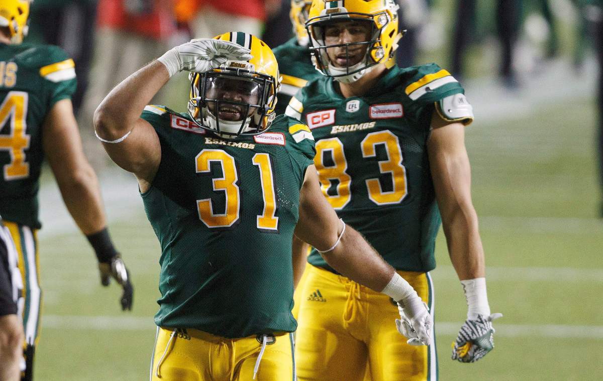 Edmonton Eskimos' Calvin McCarty (31) celebrates a touchdown against the Winnipeg Blue Bombers during first half CFL action in Edmonton, Alta., on Saturday September 30, 2017. 