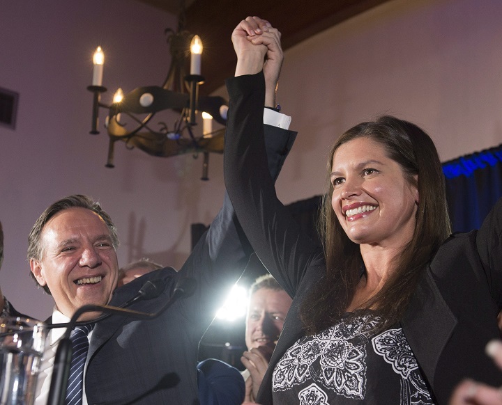 Coalition Avenir Quebec candidate Genevieve Guilbault celebrates her victory with leader Francois Legault, in a provincial by-election in the riding of Louis-Hebert, Monday, October 2, 2017 in Quebec City. 