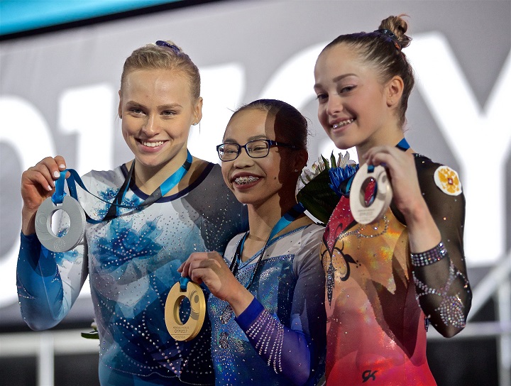 Gold medalist Morgan Hurd of the USA (C), silver medalist Elsabeth Black of Canada (L) and bronze medalist Elena Eremina of Russia (R) pose with their medals following the Women's All-Around Finals at the FIG Artistic Gymnastics World Championships in Montreal, Canada, 06 October 2017.  EPA/.