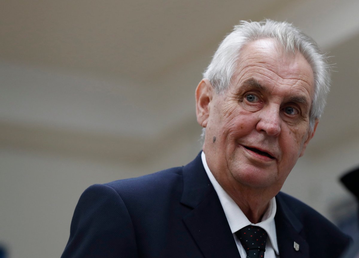 Czech Republic's President Milos Zeman prepares to cast his vote during the parliamentary elections in Prague, Czech Republic, Friday, Oct. 20, 2017. Czechs are voting in a parliamentary election whose result could see yet another euro-skeptic government on the continent. Two hundred seats are up for grab in the lower house of Parliament in the two-day ballot that began on Friday. 