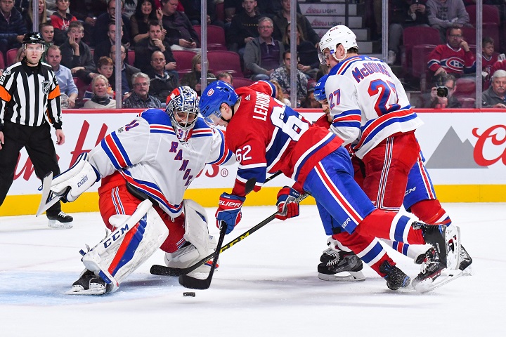 Mandatory Credit: Photo by David Kirouac/CSM/REX/Shutterstock (9178401bt)
Montreal Canadiens left wing Artturi Lehkonen (62) shoots on New York Rangers goalie Ondrej Pavelec (31) during the New York Rangers at Montreal Canadiens game at Bell Centre in Montreal, Quebec
NHL Rangers vs Canadiens, Montreal, USA - 28 Oct 2017.