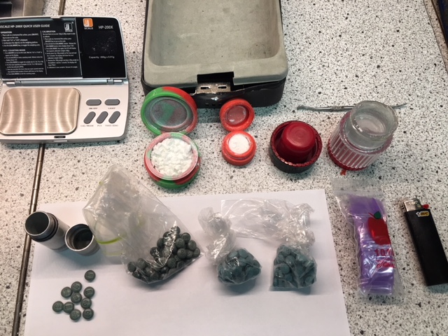 In total, 157 fentanyl tablets, half an ounce of cocaine, a quarter ounce of an unknown drug and items consistent with drug trafficking were seized. 