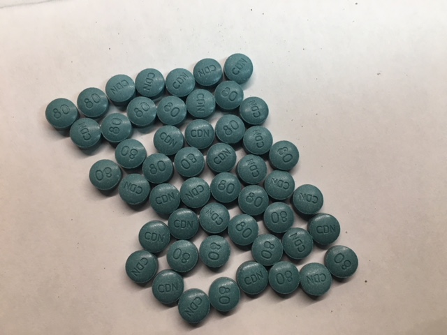 In total, 157 fentanyl tablets, half an ounce of cocaine, a quarter ounce of an unknown drug and items consistent with drug trafficking were seized.