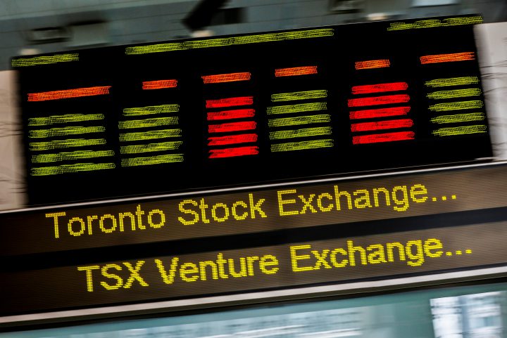 A sign board displaying Toronto Stock Exchange (TSX) stock information.