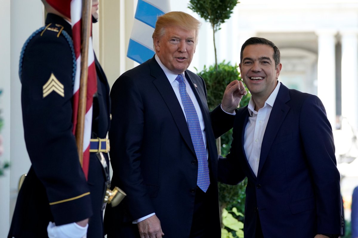 U.S. President Donald Trump greets Greek Prime Minister Alexis Tsipras as he arrives at the White House Tuesday.