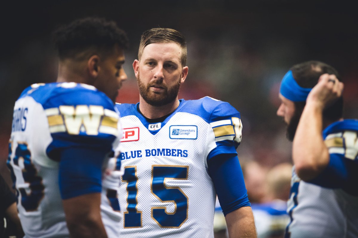 Matt Nichols (15) and Andrew Harris (33) of the Winnipeg Blue Bombers during the game against the BC Lions at BC Place Stadium in Vancouver, BC., on Friday, July 21, 2017. 