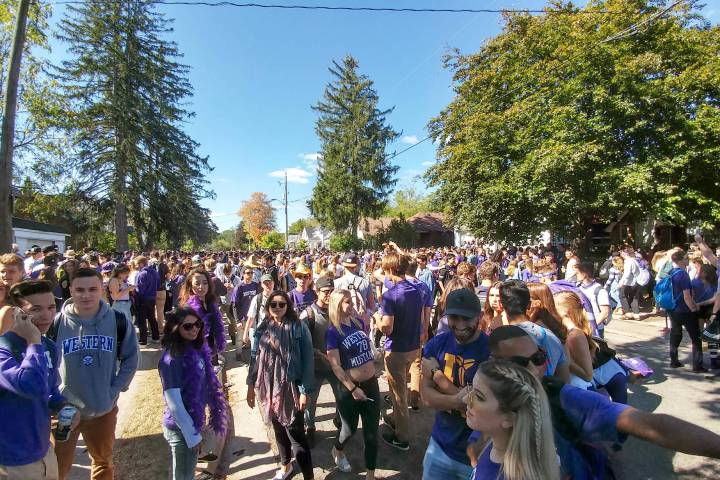 Thousands pack the street along Broughdale Ave., just past Audrey Ave. to celebrate fake homecoming.