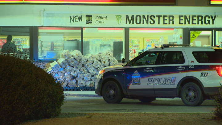 A man armed with a gun made off with cash in an early morning robbery of a Saskatoon 7-Eleven.
