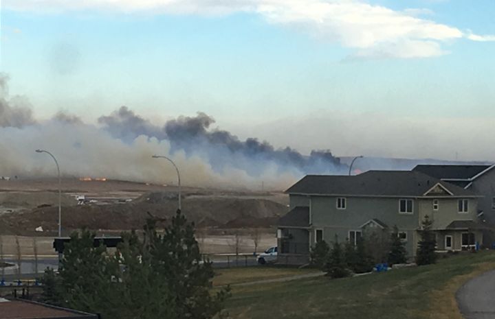 The RCMP said officers and firefighters were evacuating people living in Airdrie’s Sharp Hill neighbourhood on Tuesday afternoon because of a fire near Highway 2 that was moving east.