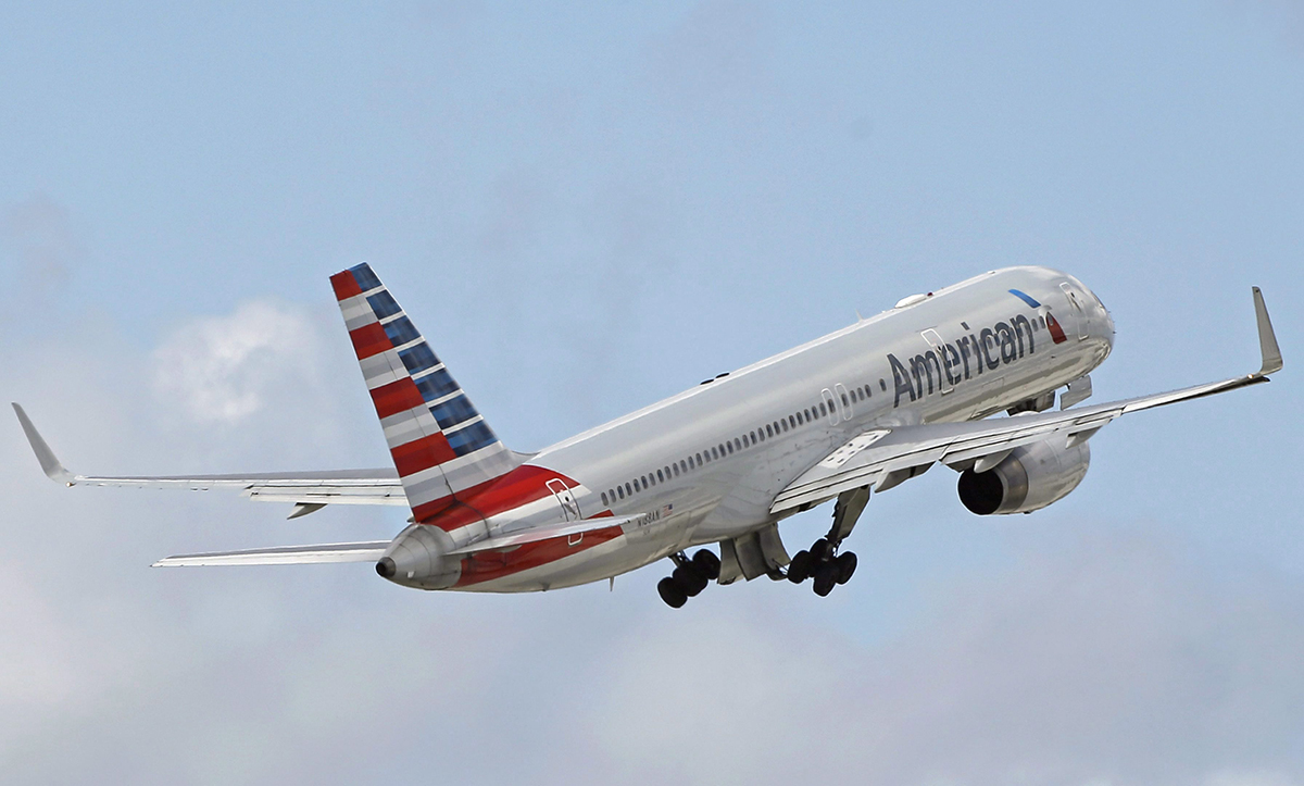 In this Friday, June 3, 2016, file photo, an American Airlines passenger jet takes off from Miami International Airport in Miami. 