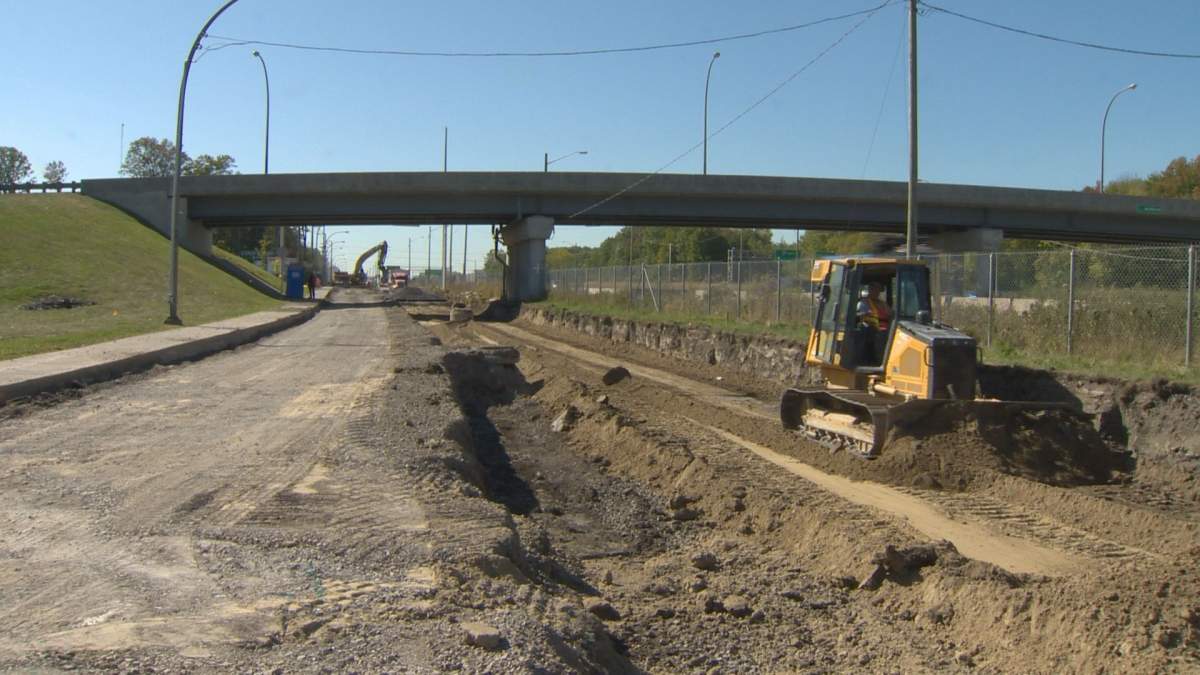 A $1 million project is underway to repave the road surface on a crucial service road that links Highway 40 to the industrial park.