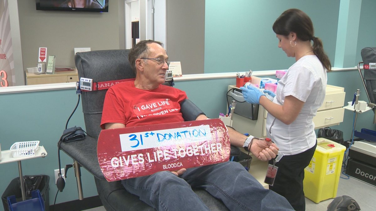 On Thursday, Robert Greig made his 31st donation, matching the number of blood units he received.