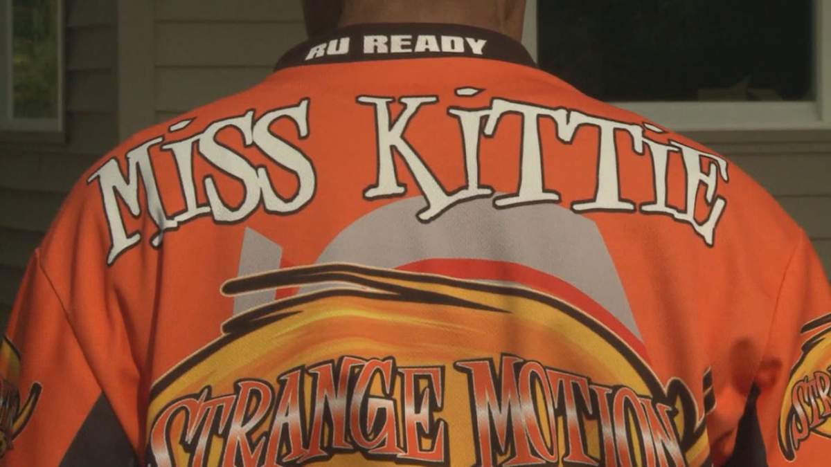 Kittie Weston-Knauer, a.k.a. Miss Kittie, shows off her racing kit.