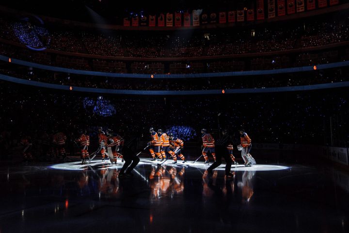 Edmonton Oilers players skate during opening ceremonies before taking on the Calgary Flames in Edmonton, Alta., on Wednesday October 4, 2017.