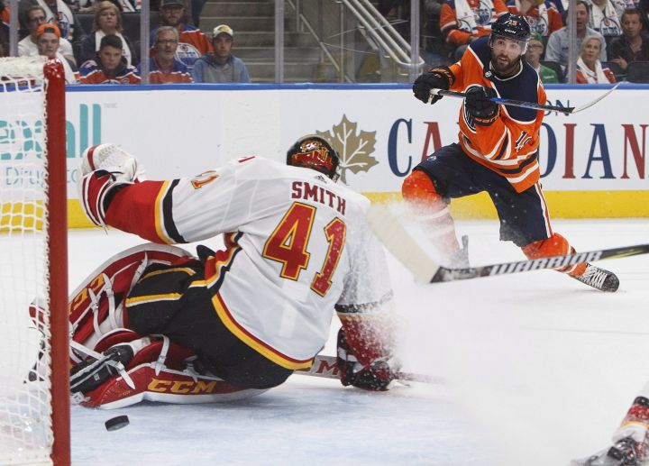 Calgary Flames goalie Mike Smith (41) makes the save on Edmonton Oilers’ Patrick Maroon (19) during second period NHL action in Edmonton, Alta., on Wednesday October 4, 2017.