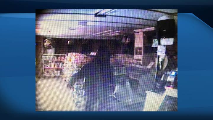 Prince Albert police have released this surveillance image of a suspect who broke into a business through the roof.