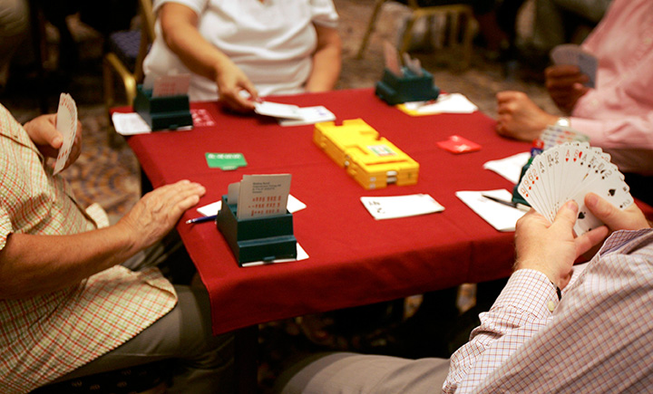 People play in an open round of Europe's biggest single venue bridge competition at the Metropole Hotel August 19, 2005 in Brighton, England. 