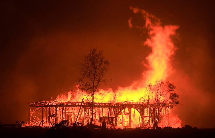 The Historic Round Barn burns on Monday Oct. 9, 2017, in Santa Rosa, California.