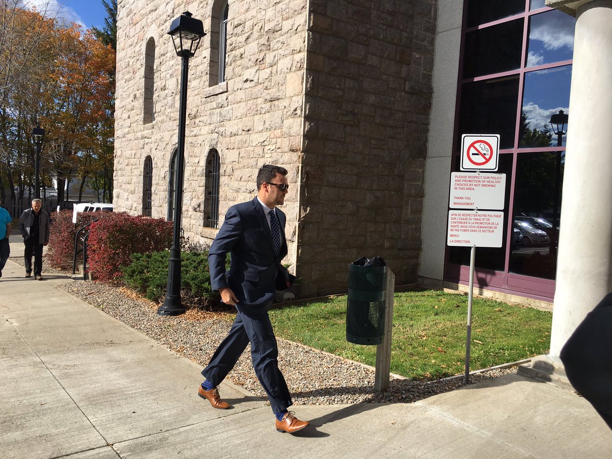 Const. Mathieu Bourdreau enters the courthouse in Bathurst, N.B. 