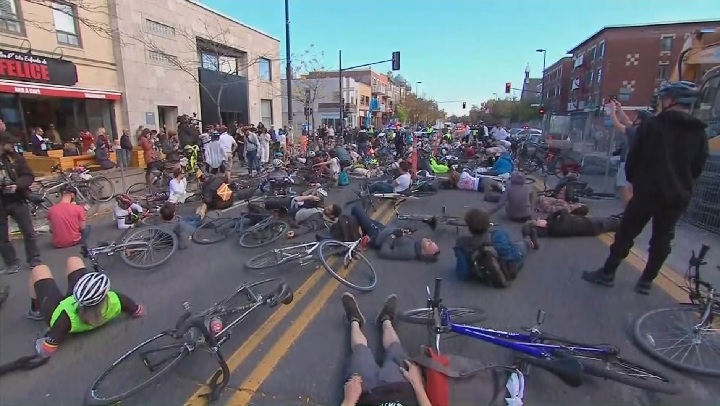 Montreal cyclists staged a die-in on Parc Avenue to highlight the need for greater road safety measures to protect cyclists and pedestrians on Saturday, Oct. 28, 2017.