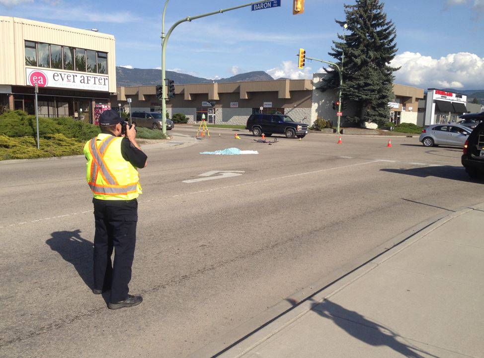 RCMP investigate a crash that killed a Kelowna bicyclist on April 15, 2016.