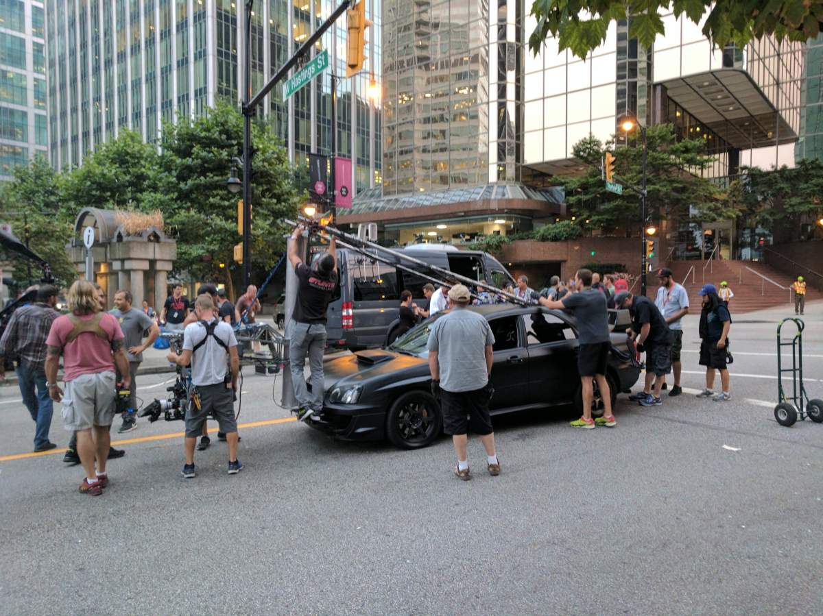 Crews rig up a pursuit camera car on the set of Deadpool 2.