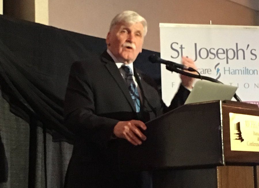 Romeo Dallaire speaks to a crowd at Michaelangelo's in Hamilton about PTSD on Thursday.