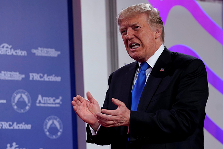 U.S. President Donald Trump applauses at the 2017 Values Voter Summit in Washington, DC, October 13, 2017. 