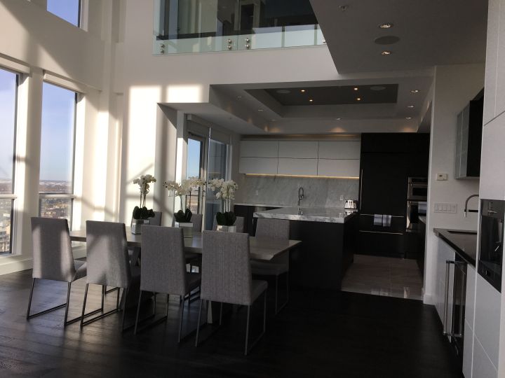 This two-storey penthouse in Edmonton’s Ultima Tower is on the market for $3.13 million and comes with a Bentley.