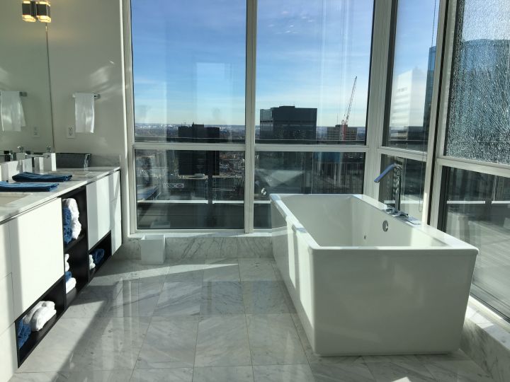 This two-storey penthouse in Edmonton’s Ultima Tower is on the market for $3.13 million and comes with a Bentley.